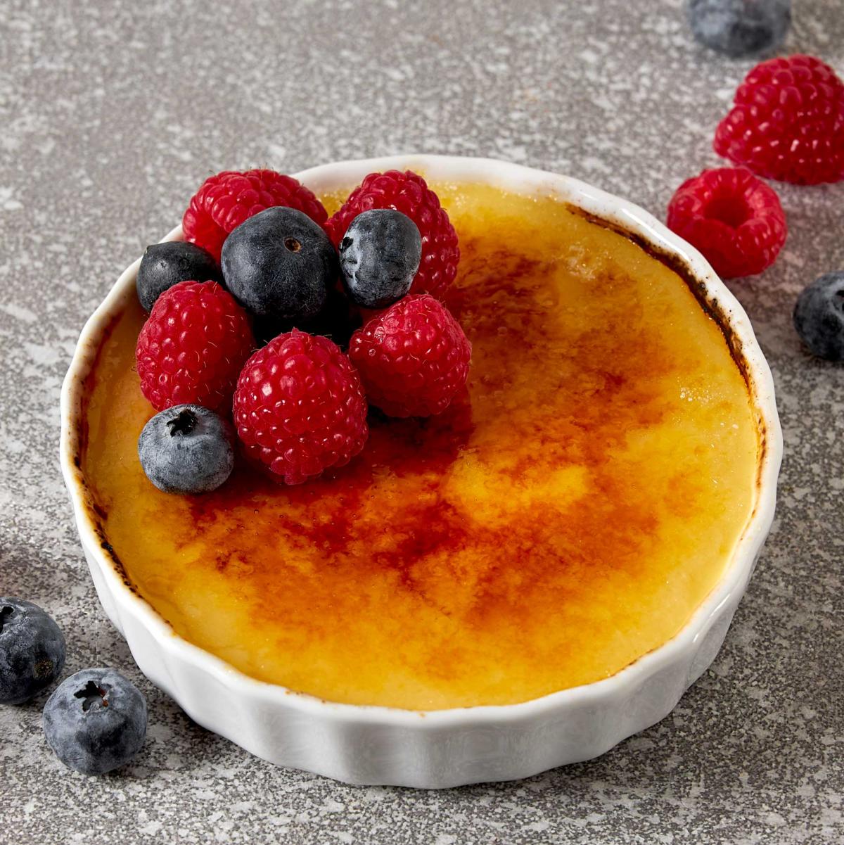 Caramel Sea Salt Eggnog Cr&egrave;me Br&ucirc;l&eacute;e with fresh berries