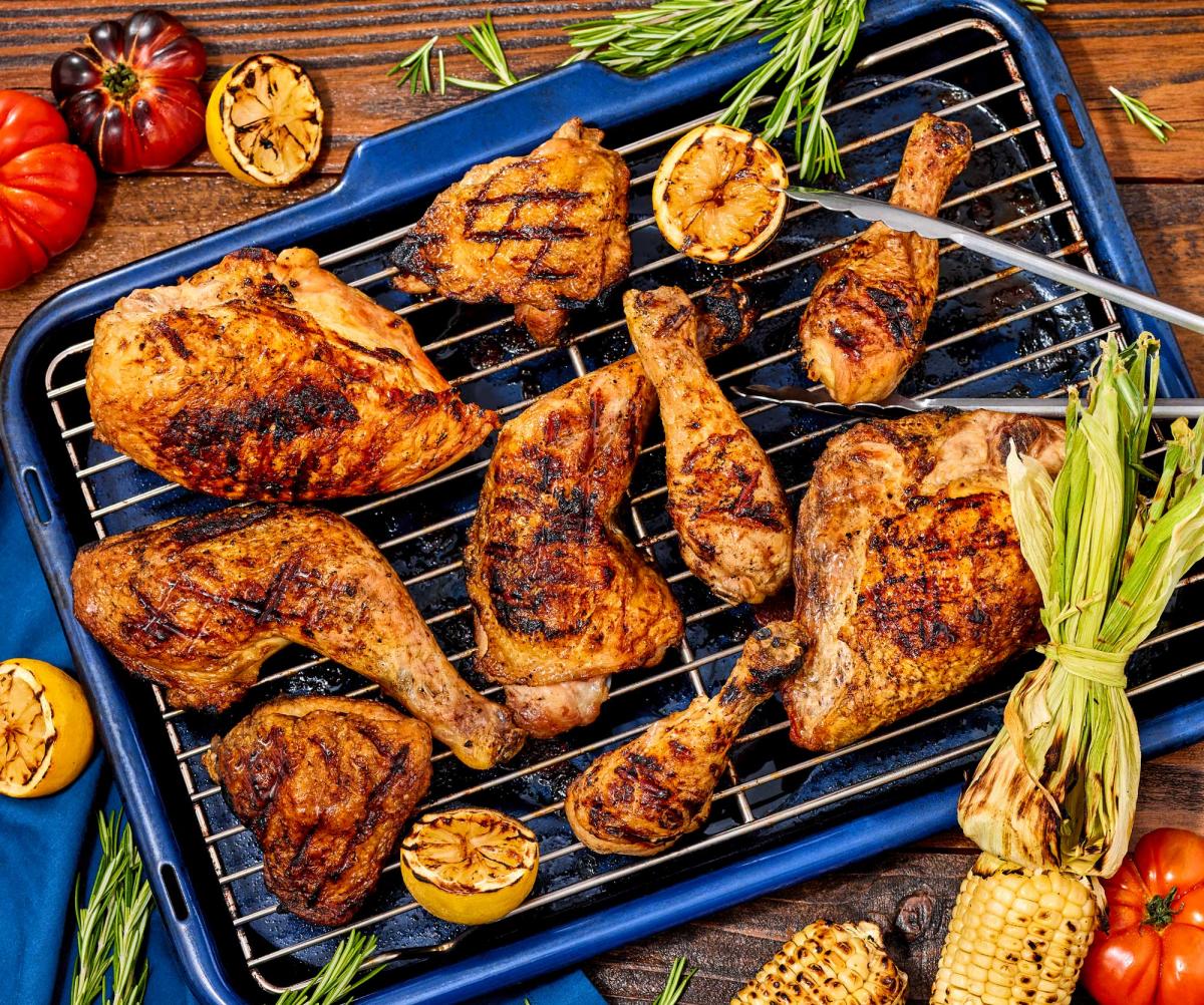 Grilled Mixed Chicken like Legs, Thighs, Drumsticks, Quarters, Breasts with grilled summer vegetables