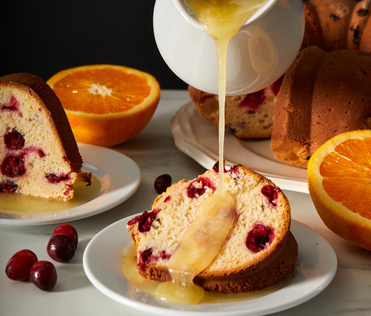 Cranberry Vanilla Pudding Cake with Hot Orange Butter Sauce