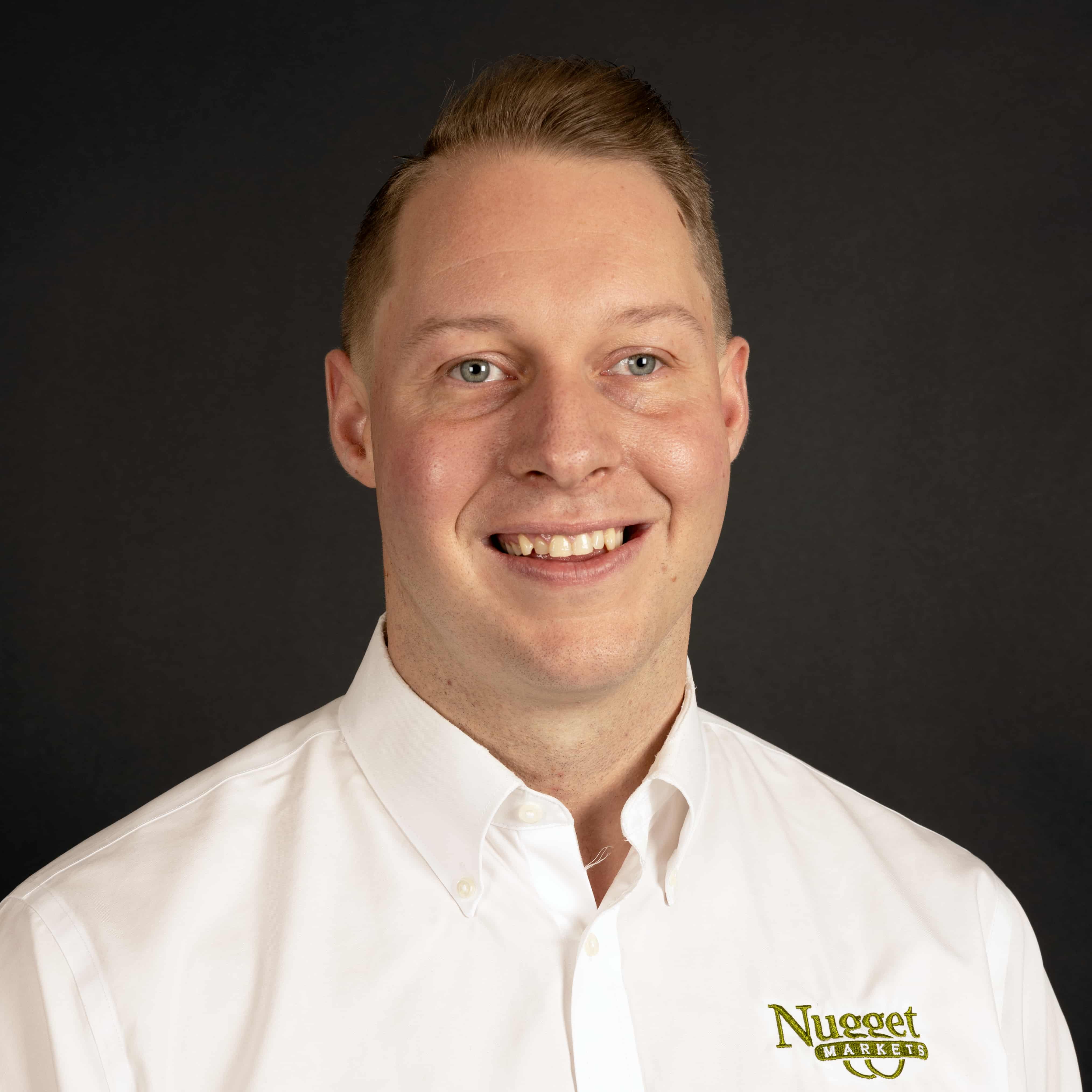 Portrait of Jonathan Donnelly, Store Director for Nugget Markets