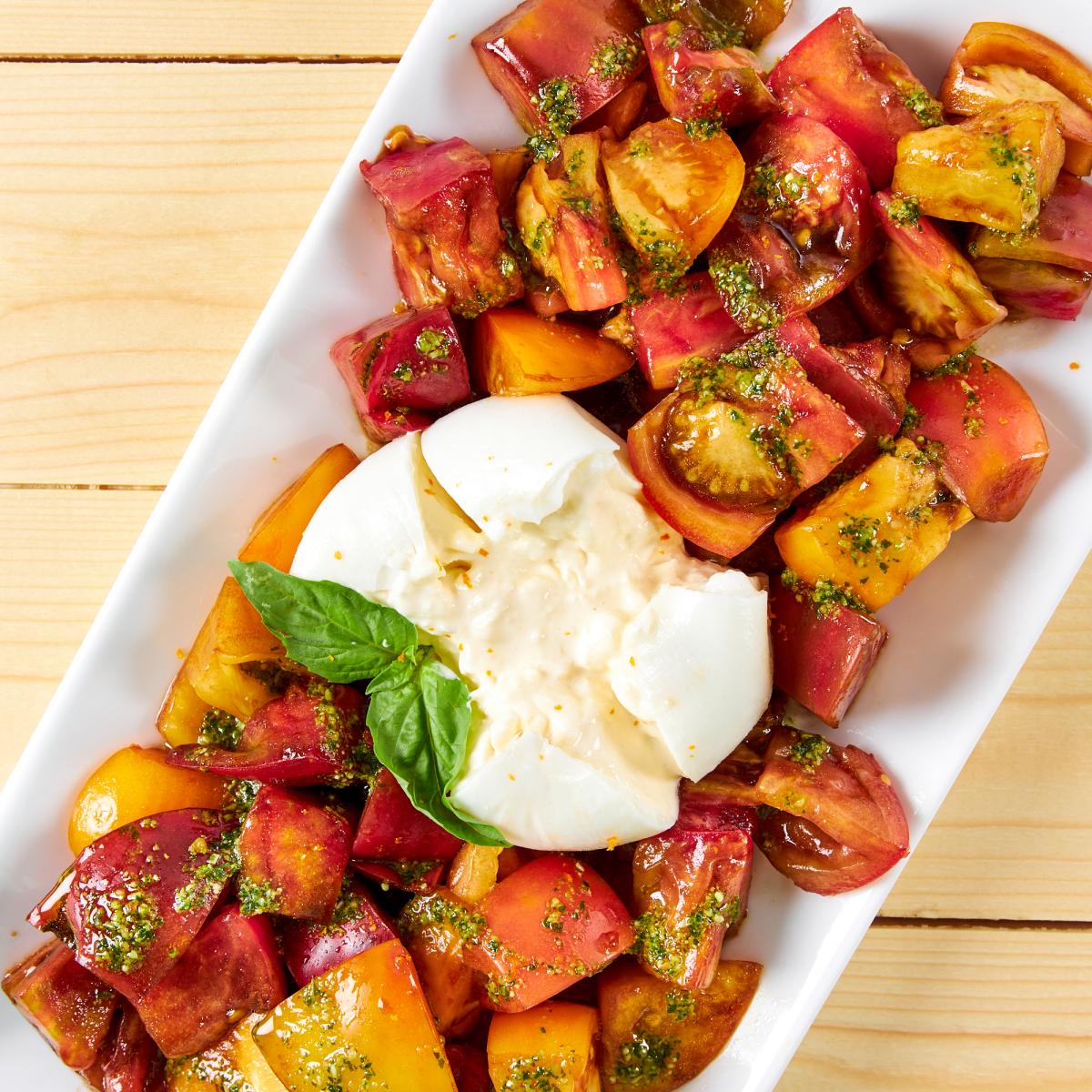 Marinated heirloom tomatoes with burrata cheese