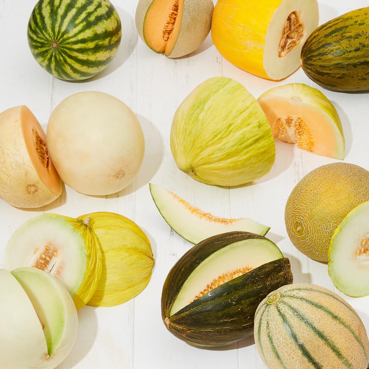 variety of whole and cut melons