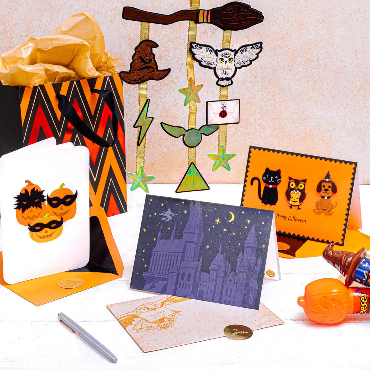 Papyrus Halloween cards, a gift bag, and a hanging card with candy on the side