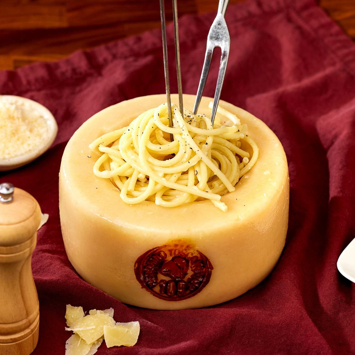 Pasta alla Ruota with Bucatini using a Pecorino Cheese Wheel