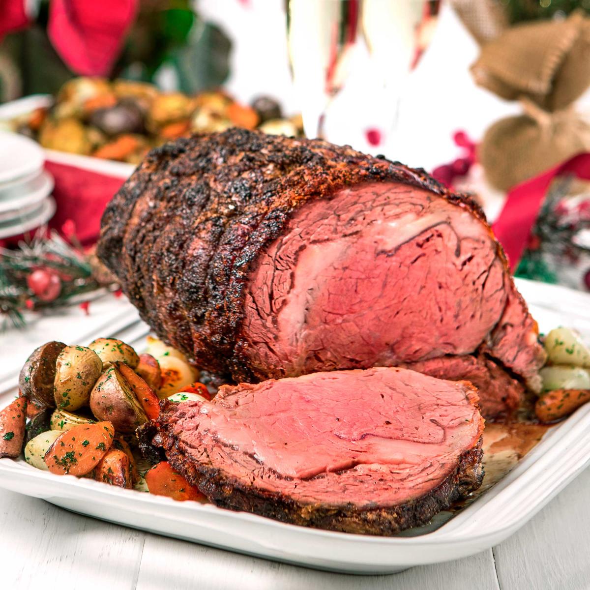sliced Standing Rib roast on a holiday table