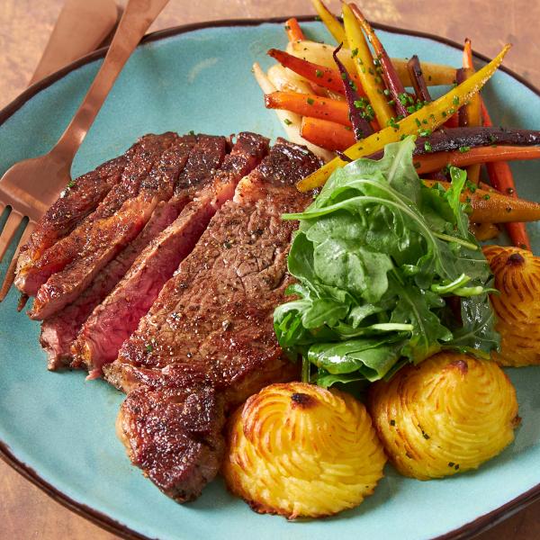 Wagyu Ribeye Steak with Duchess Potatoes and Rainbow Carrots