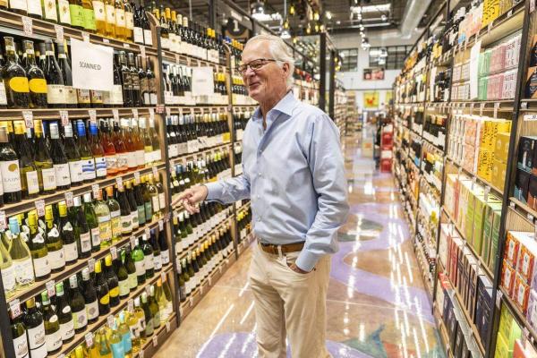 Nugget Market CEO Eric Stille stands in wine and spirits aisle of newest store in Rocklin