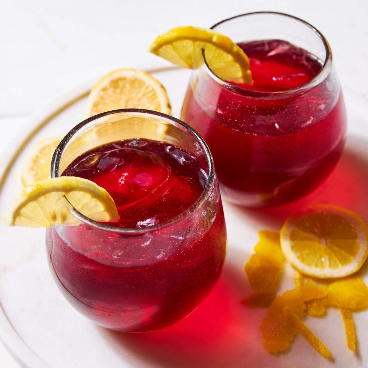 St-Germain Cranberry Elixir cocktails with lemon slices